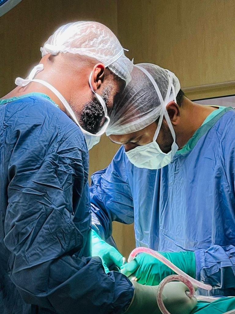 Orthopaedic surgeons operating in theatre